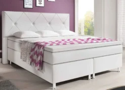 Boxspringbett mit hohem Kopfteil